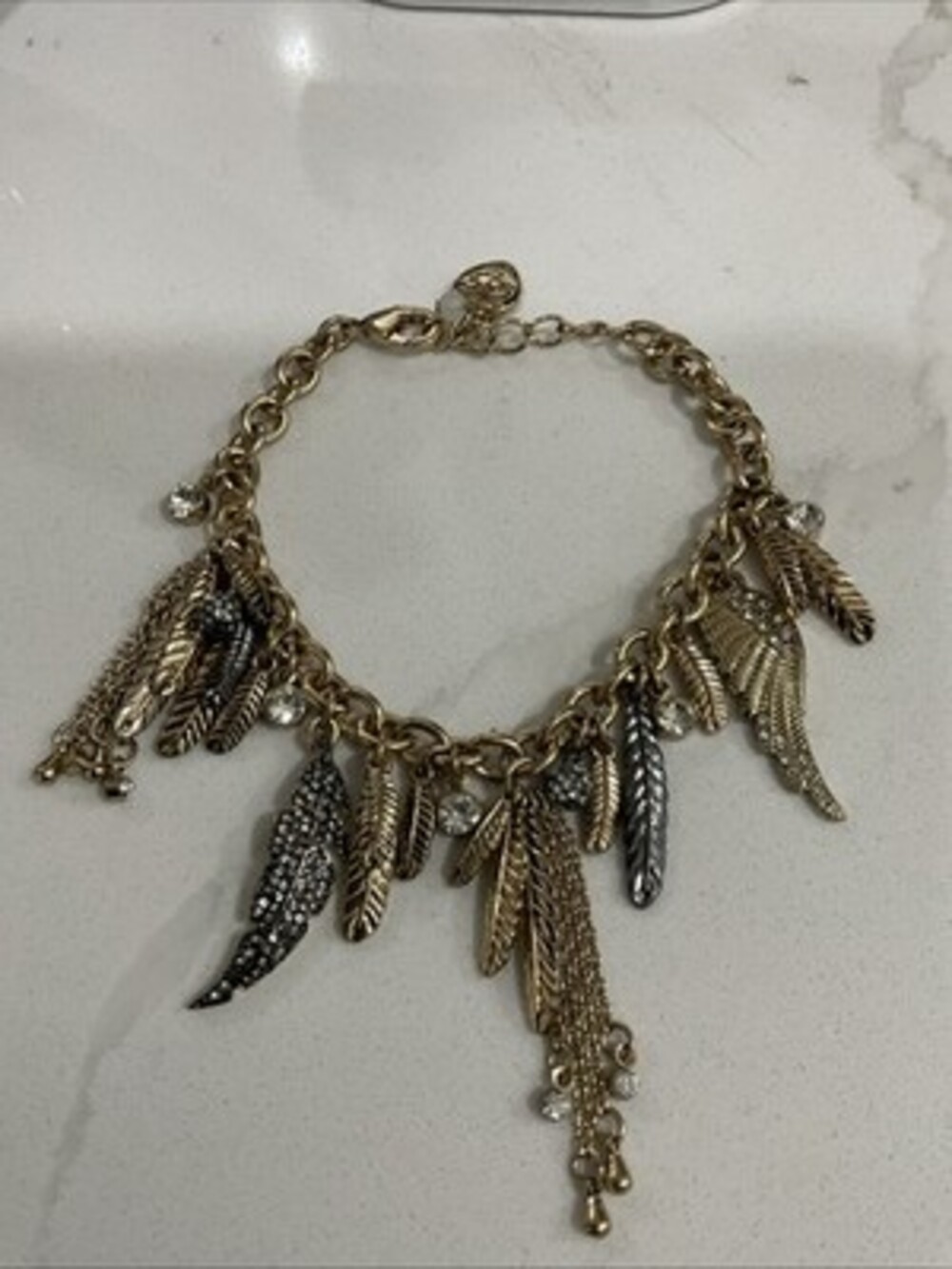 Betsey Johnson Gold Tone Feather And Rhinestone Charm Bracelet